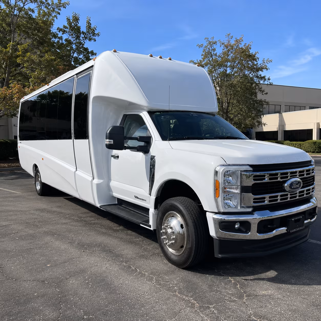 corporate airport transfer buses between logan and waltham campuses